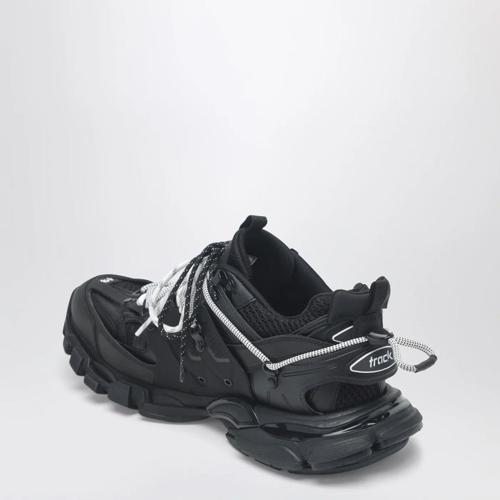 Balenciaga - Low Track Sneakers in black and white