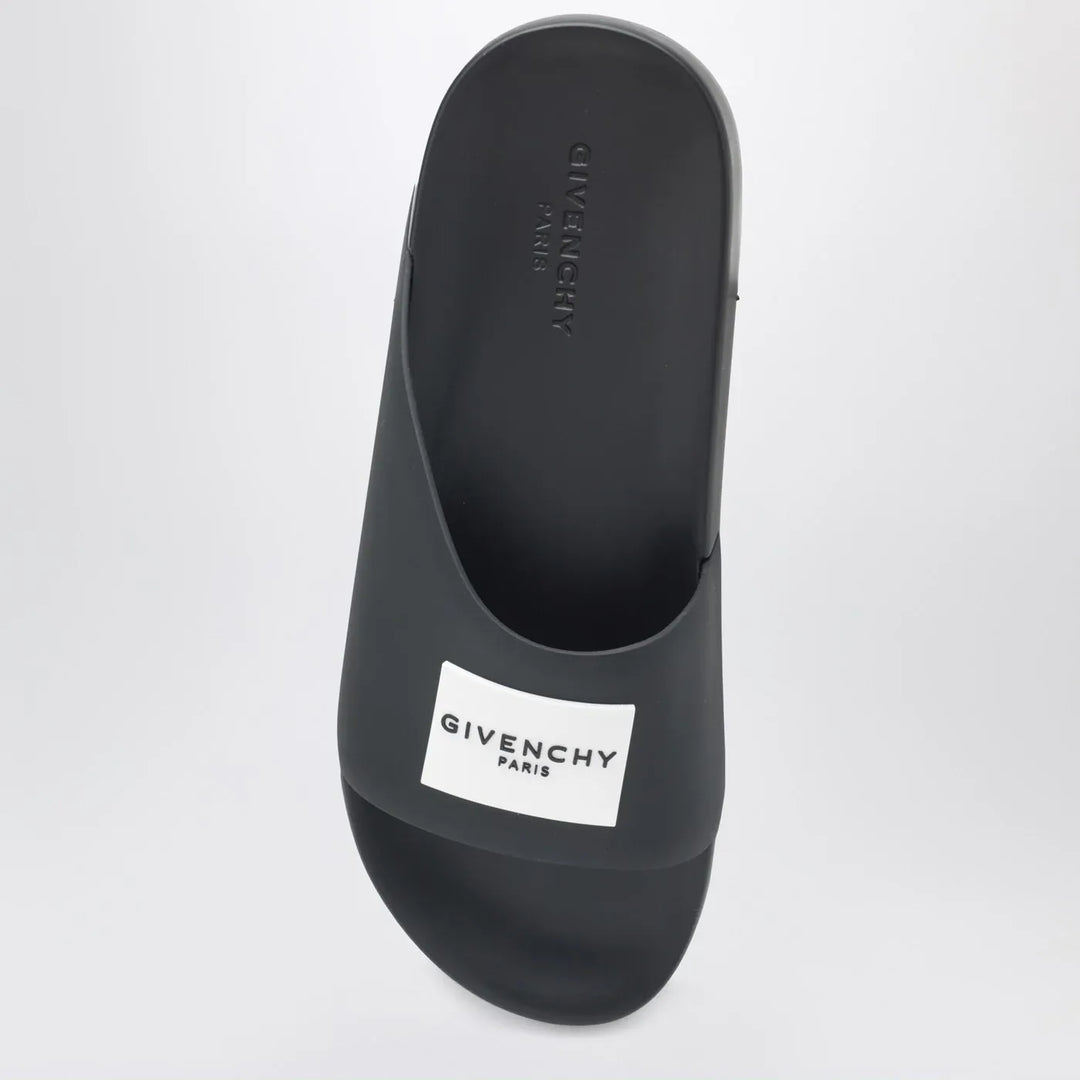 Givenchy - Label flat mules in black rubber Brand Shoes
